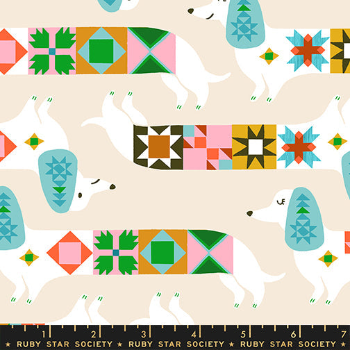 Quilty Dog in Shell quilting cotton by Ruby Star Society — a very good dog who has clearly been helping with the quilting on a soft blush pink — pattern repeat