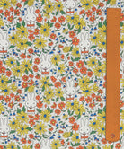 Liberty x Miffy Prairie Day Tana Lawn in cream, with golden daisies, orange poppies and blue bells, shown with a ruler for scale