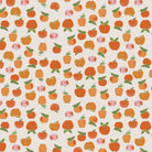 Heather Ross Favorites Apple in Red by Heather Ross for Windham Fabrics – rows of coral and orange apples on a soft cream ground (43483D-2)