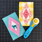 Scrappy Diamond quilt blocks made with the foundation pad