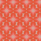 Cinnamon Toast Glass Grapes quilting cotton – a retro geometric of overlapping circles in coral on dusty rose – by Dana Willard for Art Gallery Fabrics