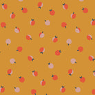 Cinnamon Toast Peach Cobbler quilting cotton – tossed peaches on a golden mustard ground – by Dana Willard for Art Gallery Fabrics