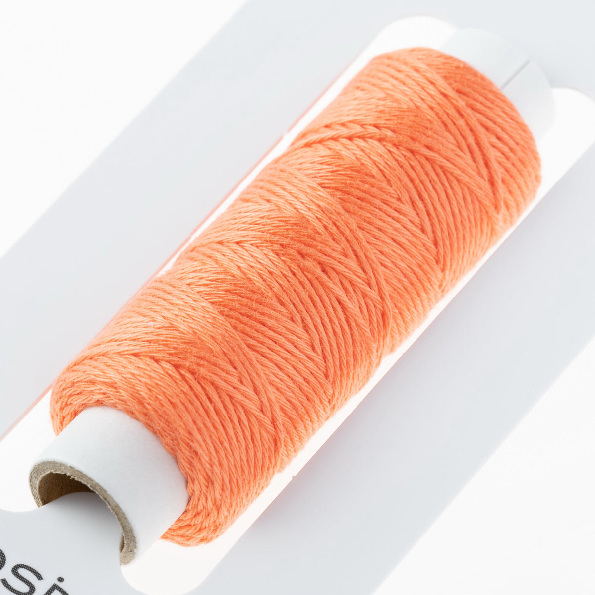 Cosmo Hidamari sashiko thread cone in Cantaloupe – view 3