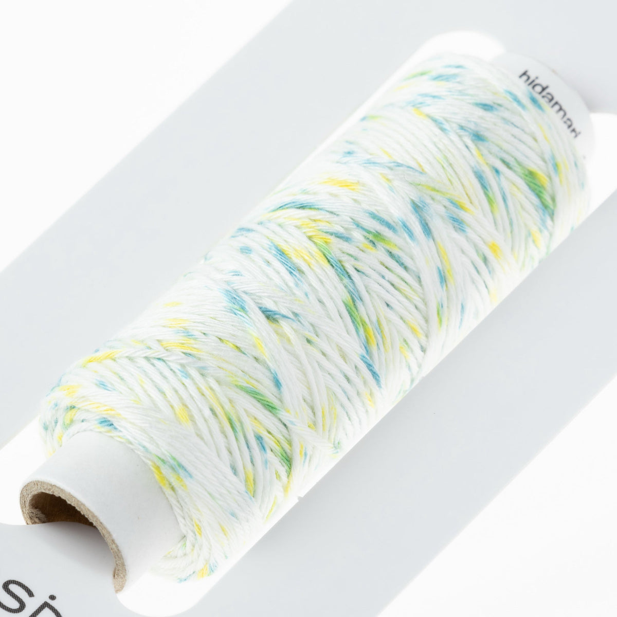 Cosmo Hidamari sashiko thread cone in Shaved Ice Yellow Green – view 3