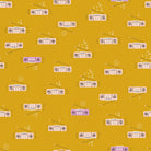 Boom in Cactus Ruby Star Linen by Ruby Star Society — boom boxes with aerials up on a deep golden mustard ground