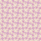 Flock Yeah in Wisteria Ruby Star Linen by Ruby Star Society — a flock of little birds mid-swoop on a soft lilac-mauve ground