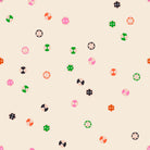 Buttons in Shell quilting cotton by Ruby Star Society — a cheerful scatter of buttons in every shape and shade on a soft blush pink