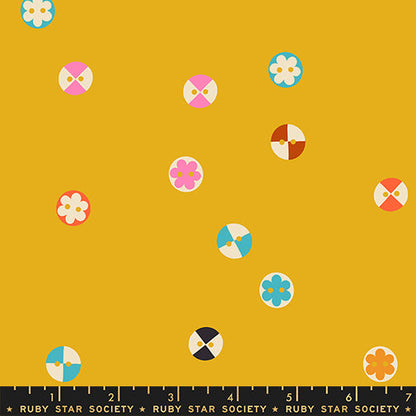 Buttons in Goldenrod quilting cotton by Ruby Star Society — a cheerful scatter of buttons in every shape and shade on a deep golden yellow — pattern repeat