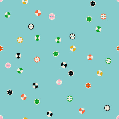 Buttons in Cloudless quilting cotton by Ruby Star Society — a cheerful scatter of buttons in every shape and shade on a clear sky blue