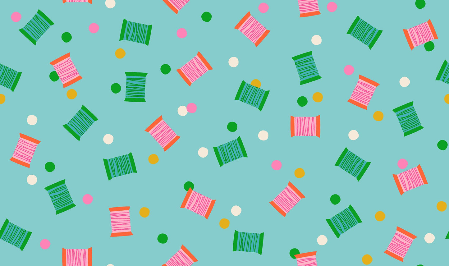 Spools in Cloudless quilting cotton by Ruby Star Society — spools of thread tossed across the cloth in a rainbow of colours on a clear sky blue