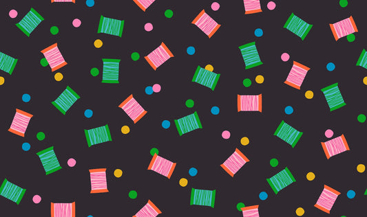 Spools in Soft Black quilting cotton by Ruby Star Society — spools of thread tossed across the cloth in a rainbow of colours on Ruby Star's signature soft black