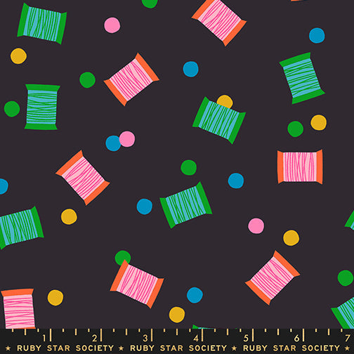 Spools in Soft Black quilting cotton by Ruby Star Society — spools of thread tossed across the cloth in a rainbow of colours on Ruby Star's signature soft black — pattern repeat